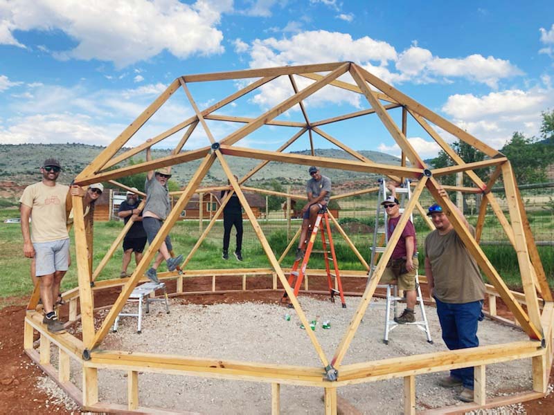 Students showcase the new geodesic dome greenhouse at the ASI campus