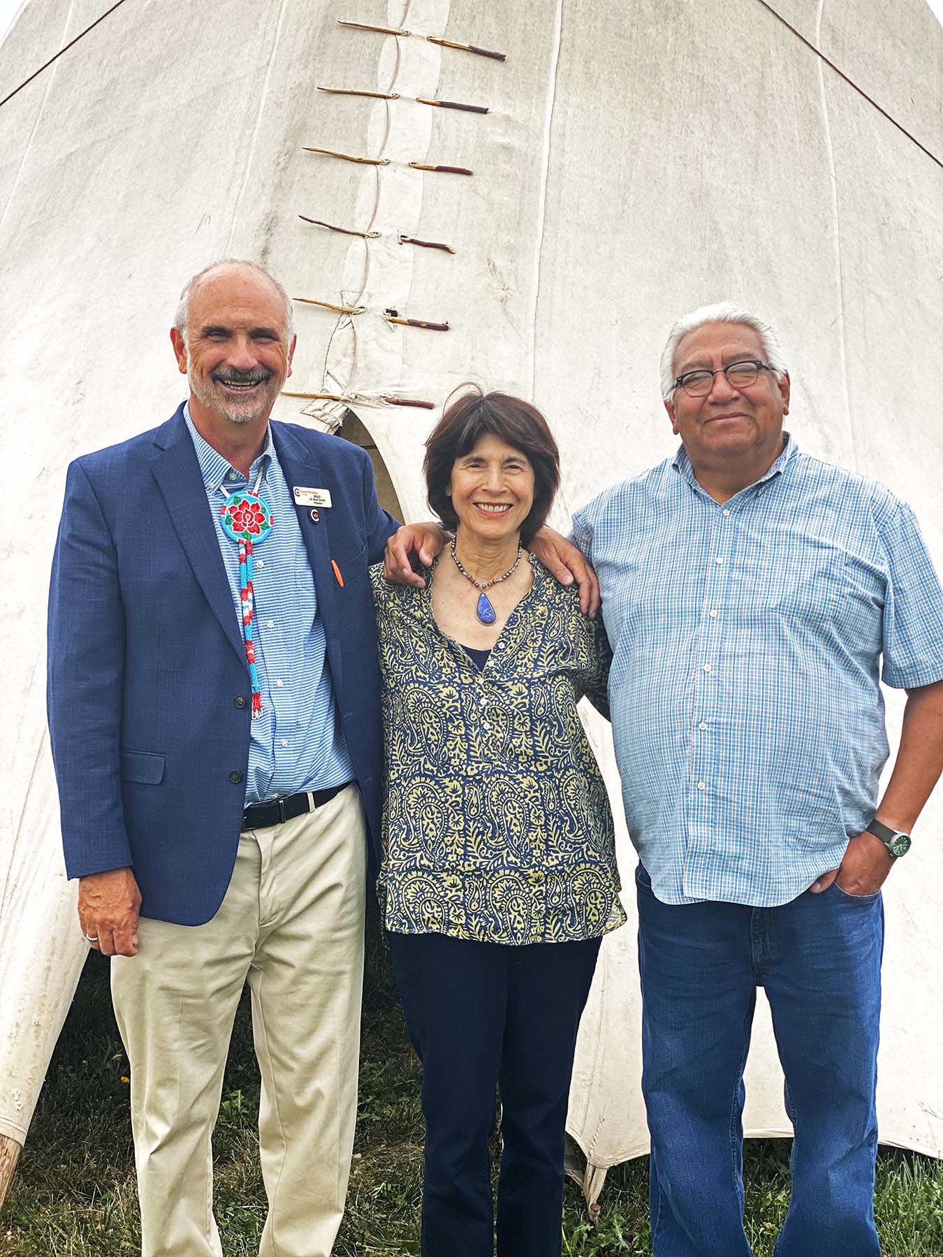 President Brad Tyndall, Ms. Berte Hirschfield, and Tribal Education Coordinator Ivan Posey