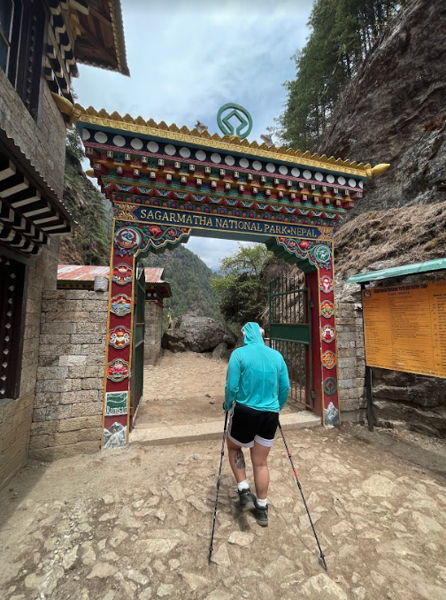 CWC Student on Mount Everest Hiking through gate