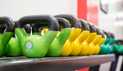 Green and yellow dumbbells